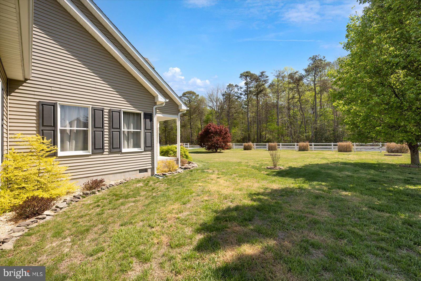 16344 Sand Hill Road Milton, DE 19968 - Photo 16 of 33 Charming home with lush green surroundings.