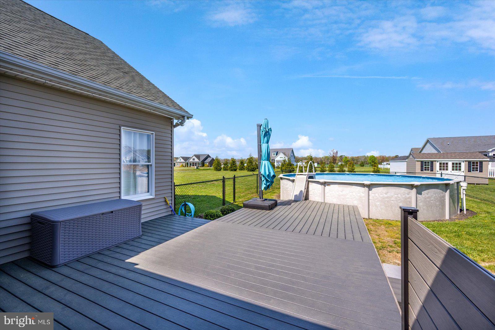 16344 Sand Hill Road Milton, DE 19968 - Photo 20 of 33 Sunny deck with poolside retreat.