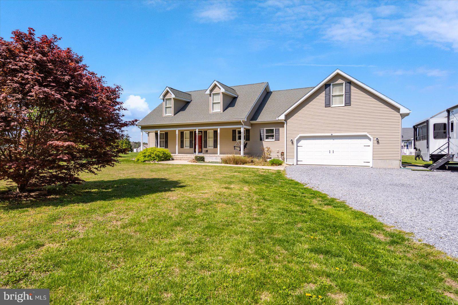 16344 Sand Hill Road Milton, DE 19968 - Photo 2 of 33 Charming home with lush green lawn.