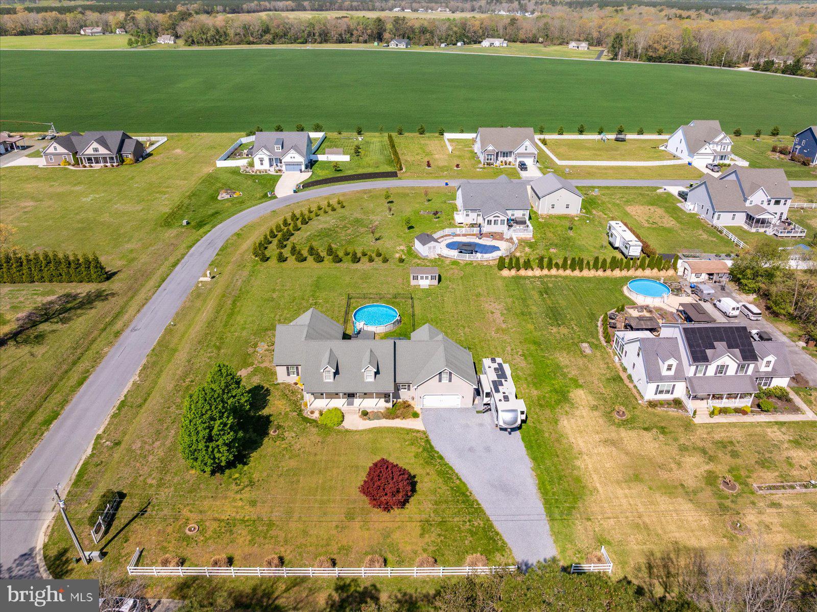 16344 Sand Hill Road Milton, DE 19968 - Photo 30 of 33 Sprawling homes amidst lush greenery.