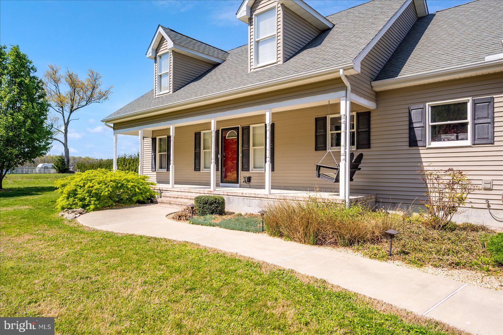 16344 Sand Hill Road Milton, DE 19968 - Photo 6 of 33 Charming home with inviting porch.