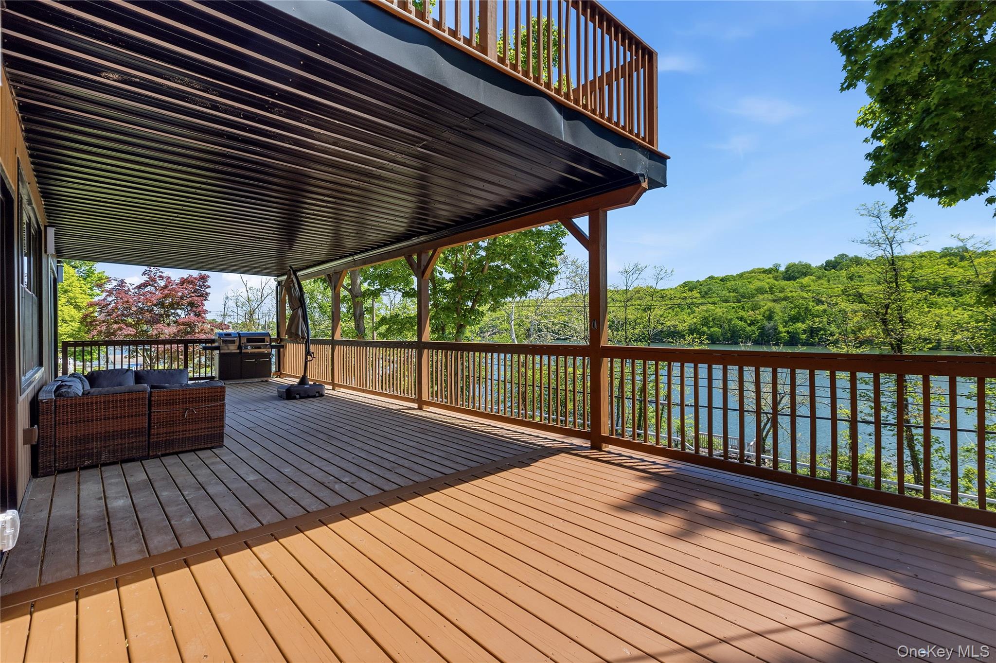 548 Lakes Road Monroe, NY 10950 - Photo 9 of 50 a view of outdoor space with wooden floor and outdoor seating