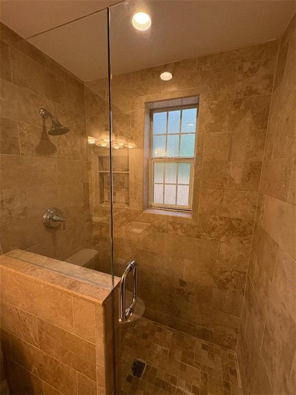 1647 Briarcliff Road Northeast, Unit 1 Atlanta, GA 30306 - Photo 6 of 11 a bathroom with a sink and a shower