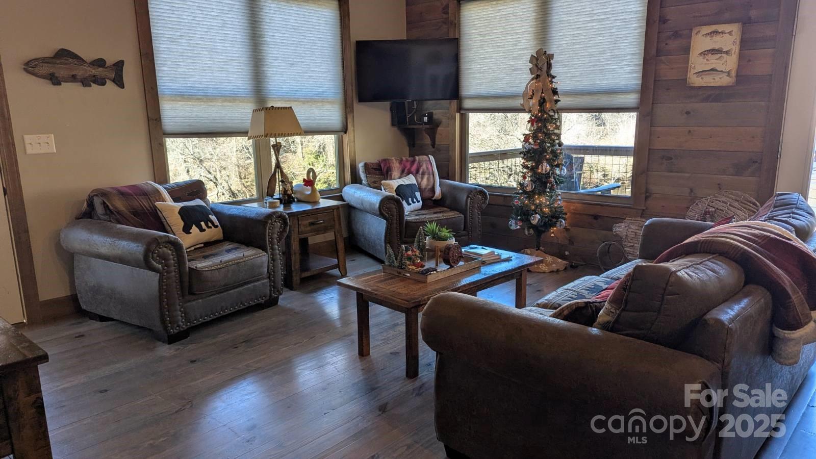 19 Santa Rosa Drive, Unit 6 Sylva, NC 28779 - Photo 4 of 10 a living room with furniture and a large window