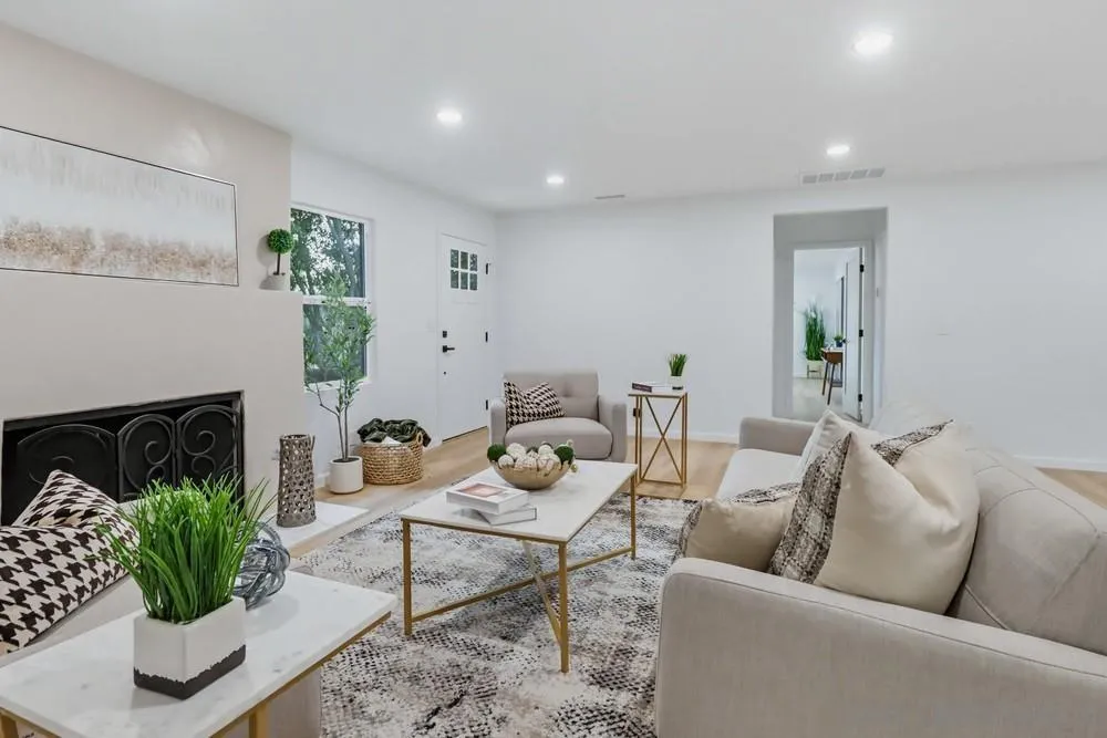 15751 Lyons Valley Road Jamul, CA 91935 - Photo 17 of 59 a living room with furniture potted plant and a fireplace