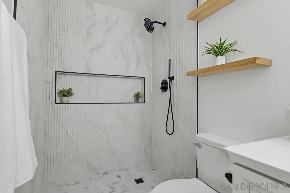 15751 Lyons Valley Road Jamul, CA 91935 - Photo 26 of 59 a bathroom with a shower and a sink