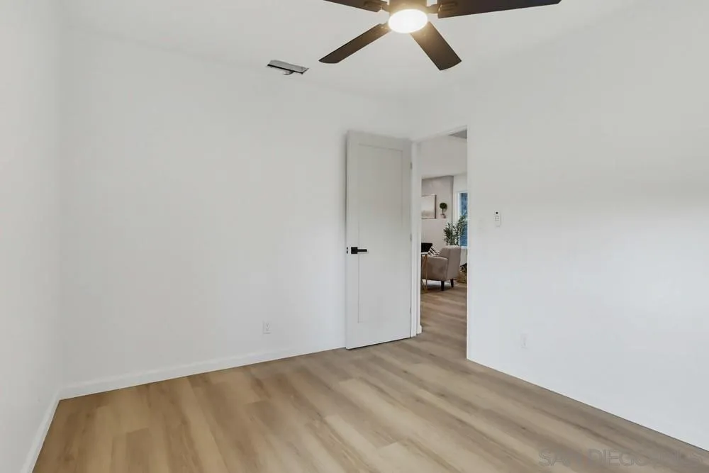 15751 Lyons Valley Road Jamul, CA 91935 - Photo 29 of 59 a view of a livingroom with wooden floor and closet