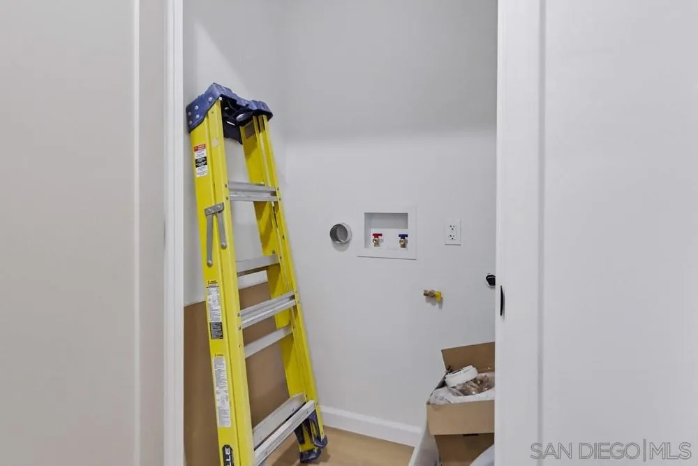 15751 Lyons Valley Road Jamul, CA 91935 - Photo 36 of 59 a bathroom with a sink and mirror with a shower