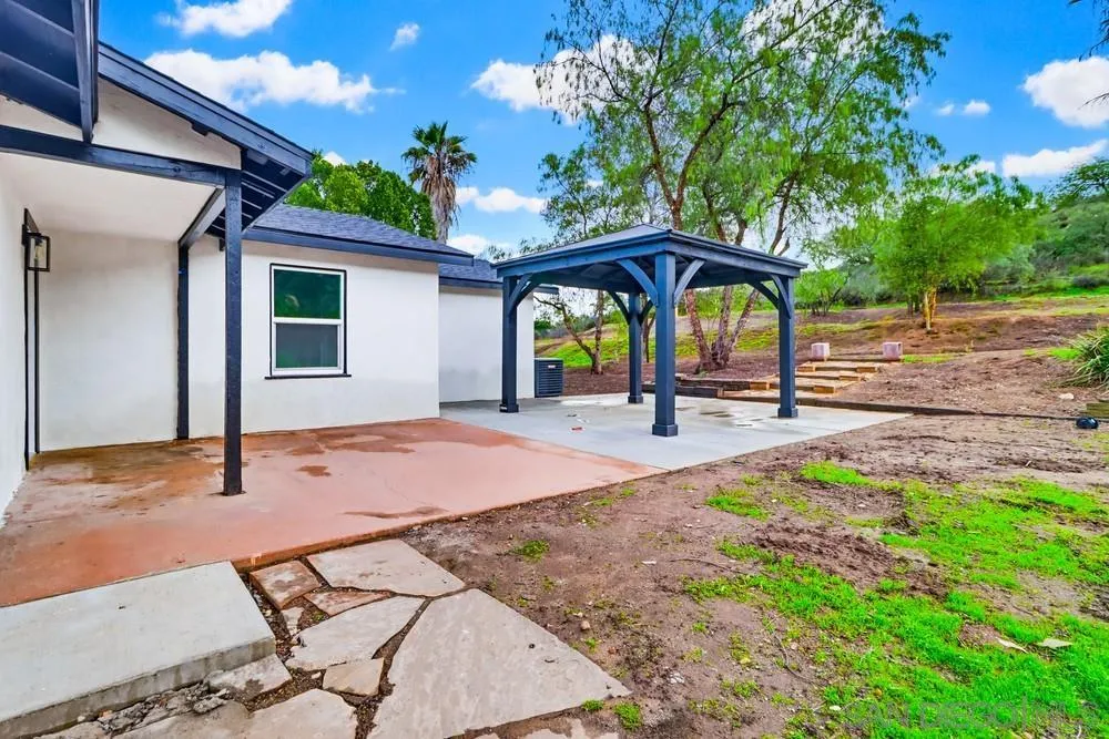 15751 Lyons Valley Road Jamul, CA 91935 - Photo 41 of 59 a view of a backyard with a patio