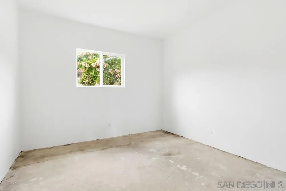 15751 Lyons Valley Road Jamul, CA 91935 - Photo 50 of 59 an empty room with a window