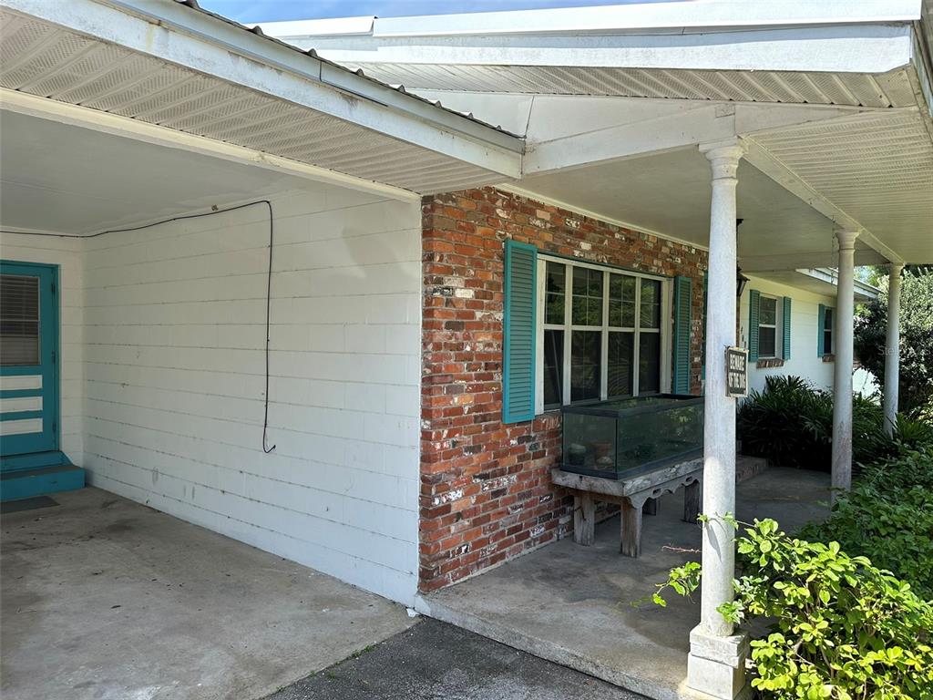 4004 Southwest 22nd Street Ocala, FL 34474 - Photo 4 of 9 a front view of a house with chairs
