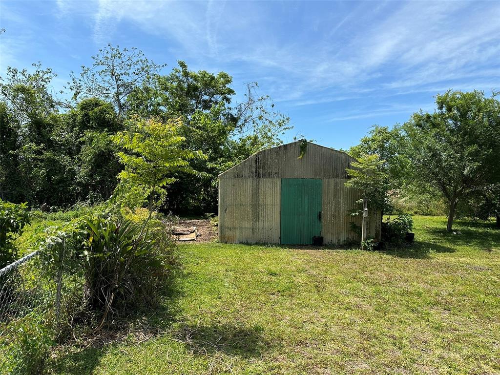 4004 Southwest 22nd Street Ocala, FL 34474 - Photo 5 of 9 a view of a backyard of the house