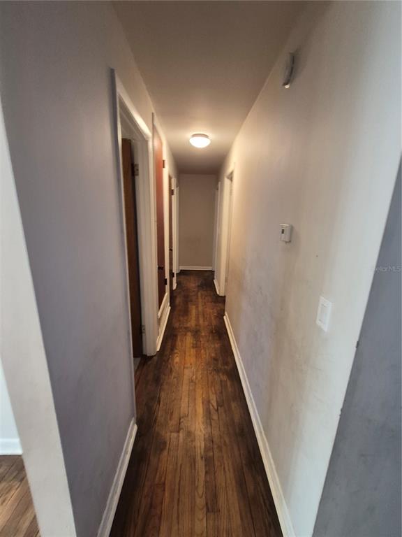 4004 Southwest 22nd Street Ocala, FL 34474 - Photo 6 of 9 a view of a hallway with wooden floor