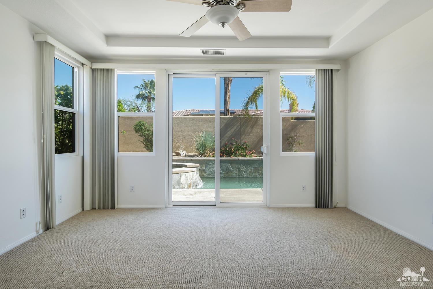 36 Shoreline Drive Rancho Mirage, CA 92270 - Photo 20 of 38 a view of an empty room with a window