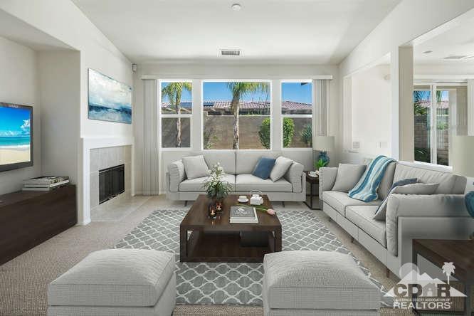 36 Shoreline Drive Rancho Mirage, CA 92270 - Photo 3 of 38 a living room with furniture fireplace and a large window