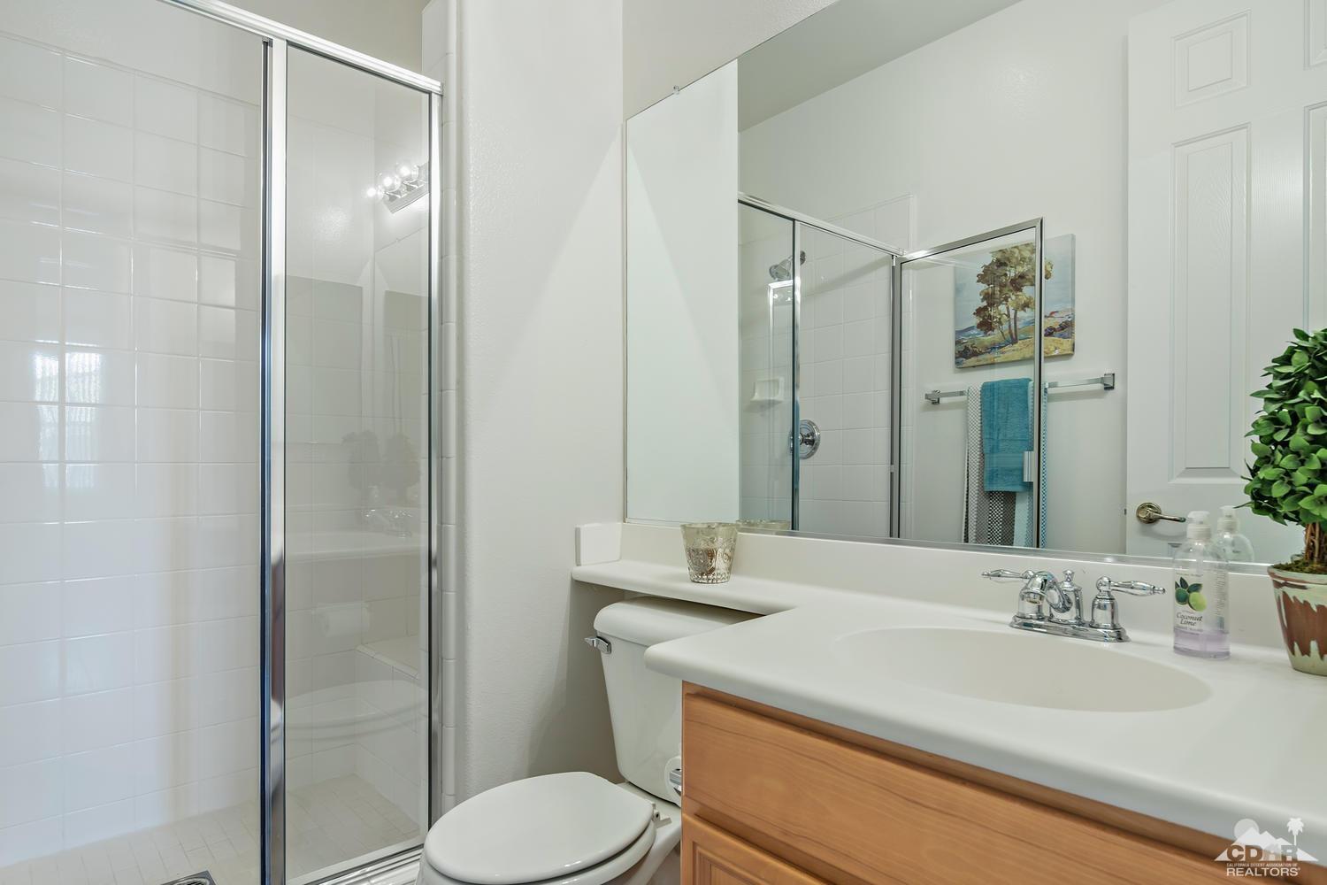 36 Shoreline Drive Rancho Mirage, CA 92270 - Photo 25 of 38 a bathroom with a sink toilet and shower