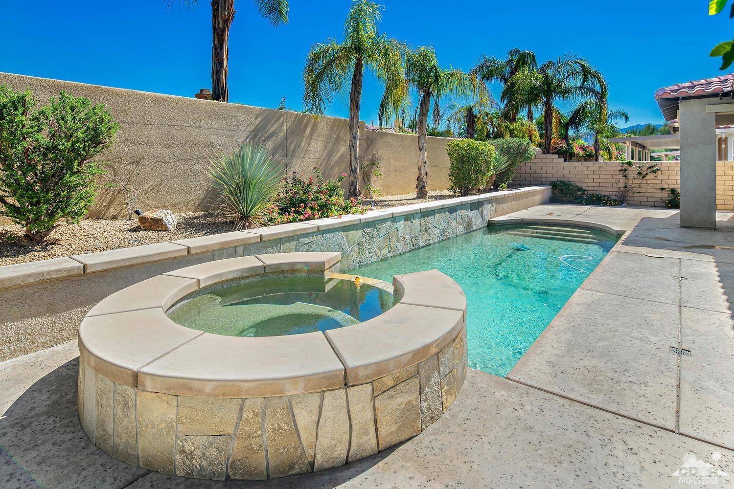 36 Shoreline Drive Rancho Mirage, CA 92270 - Photo 29 of 38 a view of a swimming pool with a patio