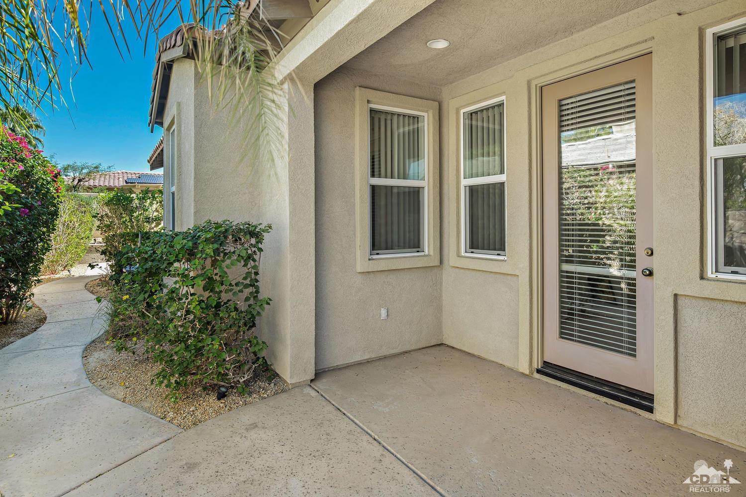36 Shoreline Drive Rancho Mirage, CA 92270 - Photo 31 of 38 a view of a house with a potted plant