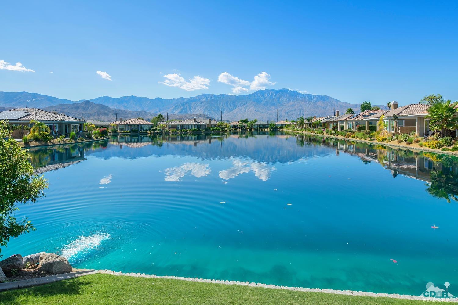 36 Shoreline Drive Rancho Mirage, CA 92270 - Photo 33 of 38 a view of a lake with a yard