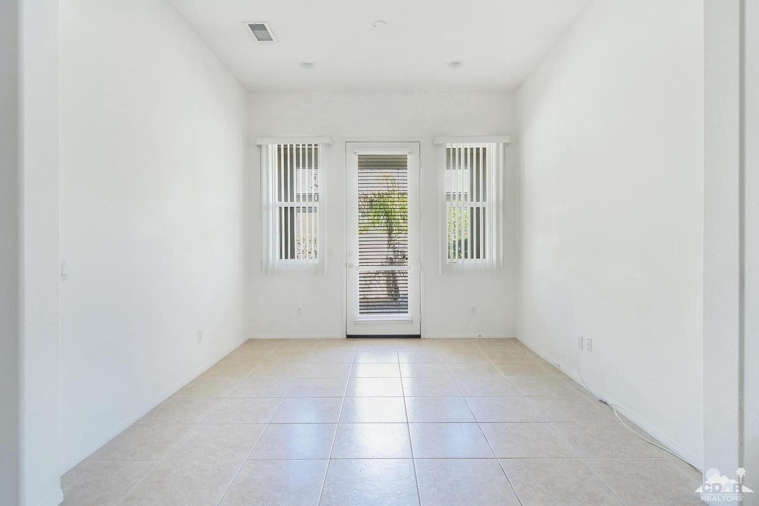 36 Shoreline Drive Rancho Mirage, CA 92270 - Photo 5 of 38 a view of an empty room with a window