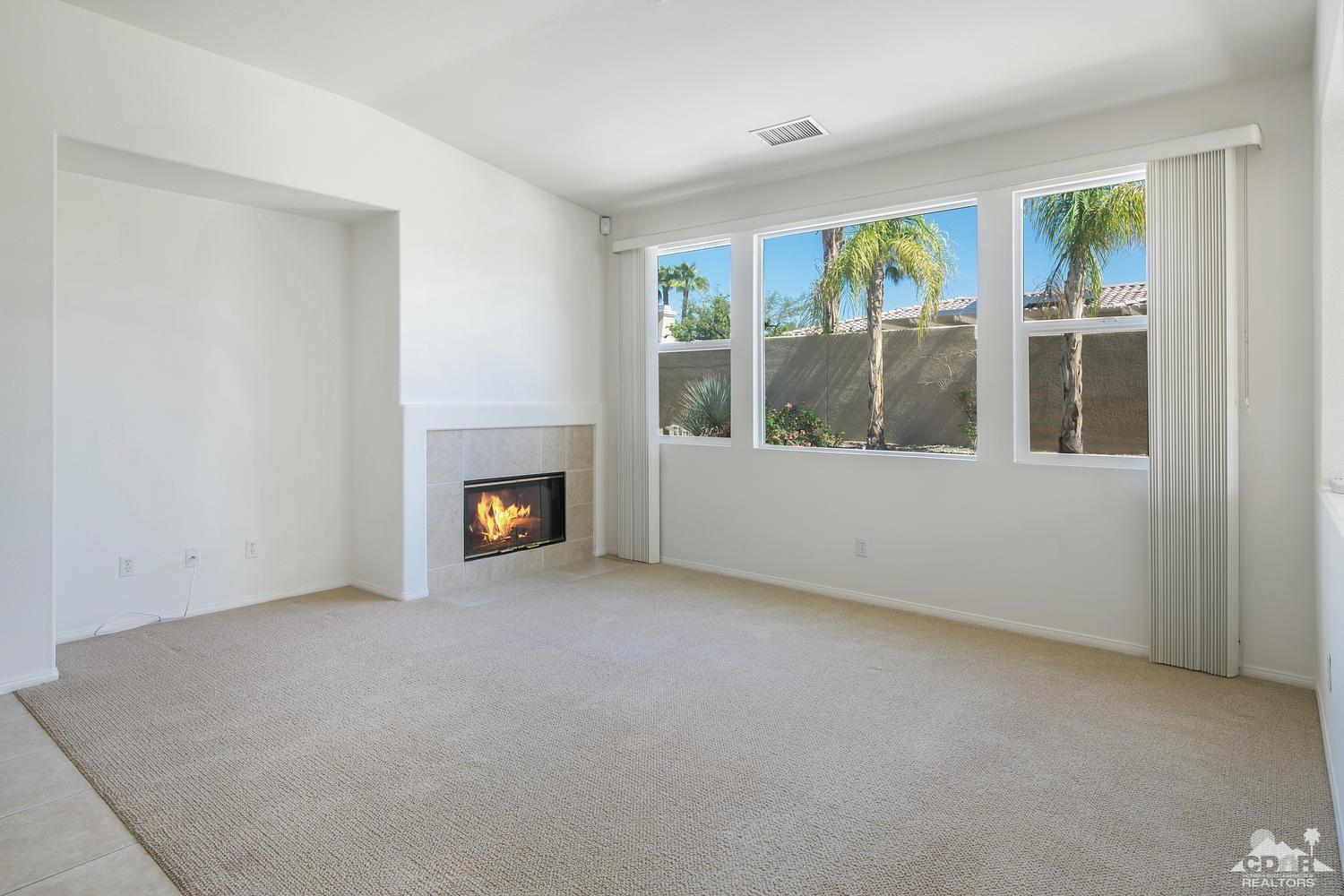 36 Shoreline Drive Rancho Mirage, CA 92270 - Photo 6 of 38 an empty room with windows