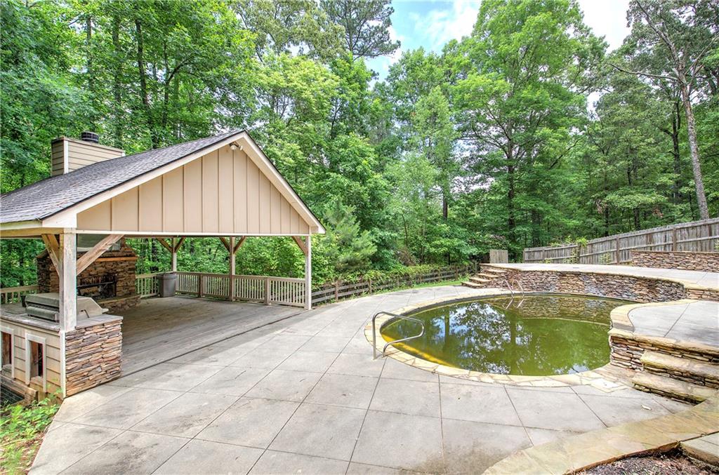 561 Holland Road Dallas, GA 30157 - Photo 40 of 48 a view of outdoor space yard swimming pool and patio