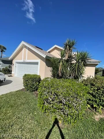 a view of a lake with a building in the background