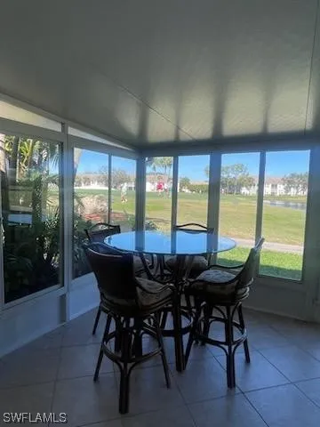 a kitchen with a sink a counter top space cabinets and stainless steel appliances