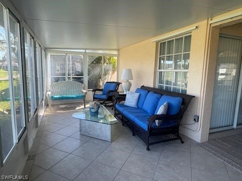 20918 Country Barn Drive Estero, FL 33928 - Photo 13 of 48 a living room with furniture and a large window