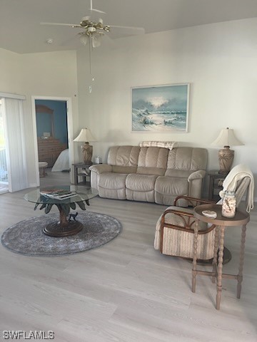 20918 Country Barn Drive Estero, FL 33928 - Photo 46 of 48 a living room with furniture and a chandelier