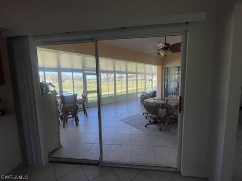 20918 Country Barn Drive Estero, FL 33928 - Photo 10 of 48 a living room with furniture and a floor to ceiling window