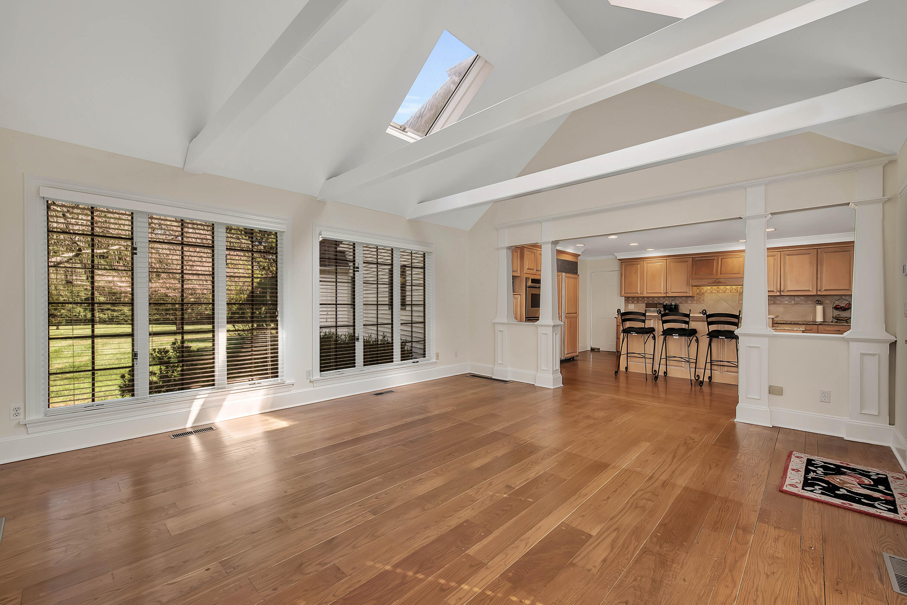 Undisclosed Address New Canaan, CT 06840 - Photo 17 of 38 a view of an empty room with wooden floor and a window