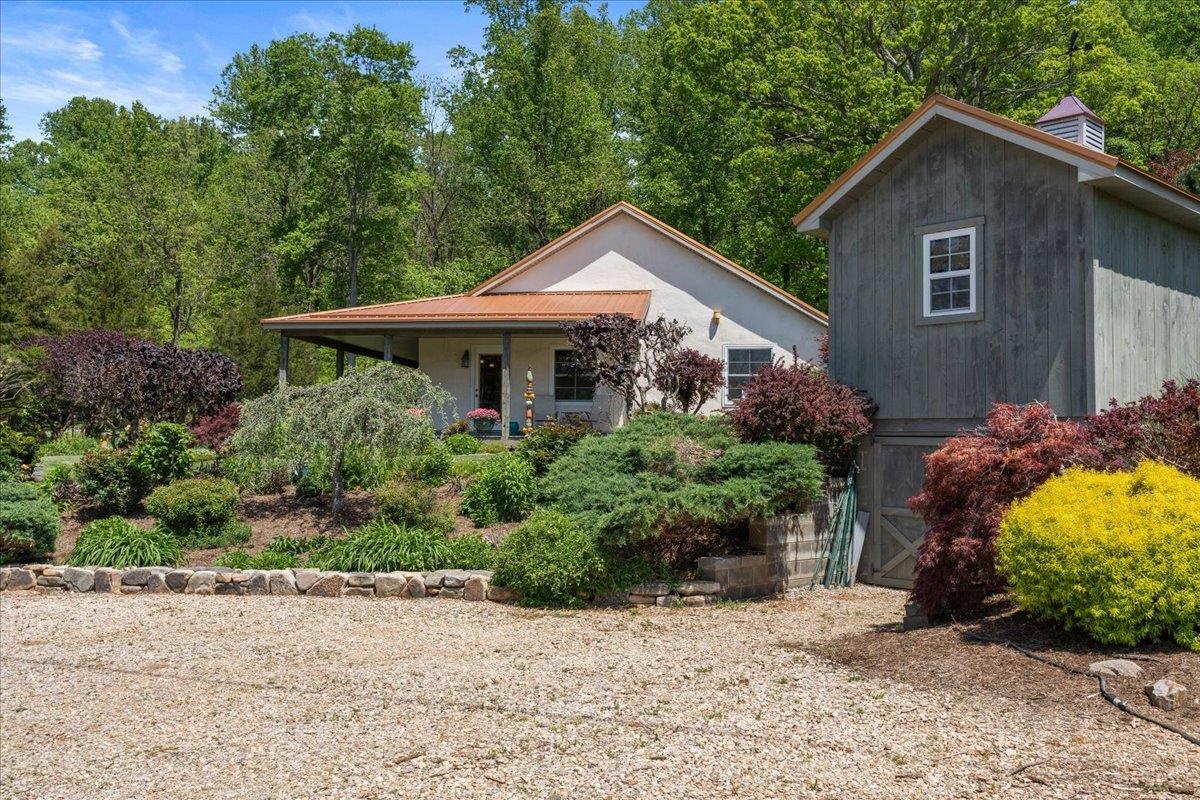 650 Sandy Bottom Road Elkton, VA 22827 - Photo 13 of 75 a front view of a house with a yard