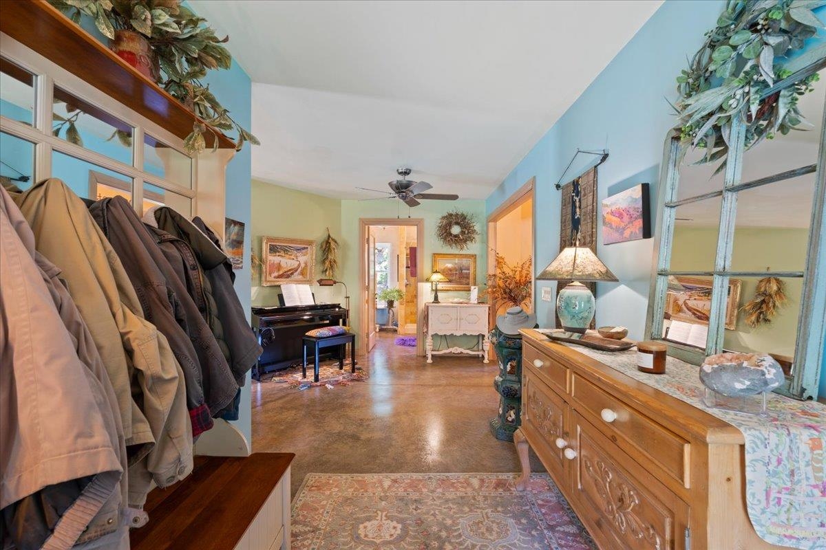 650 Sandy Bottom Road Elkton, VA 22827 - Photo 16 of 75 a living room with furniture a rug and a window