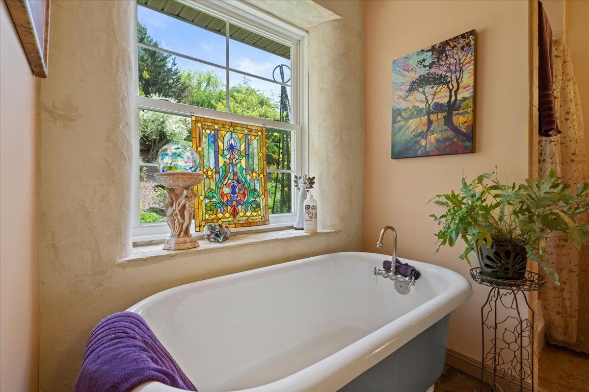 650 Sandy Bottom Road Elkton, VA 22827 - Photo 31 of 75 a bath tub sitting next to a window