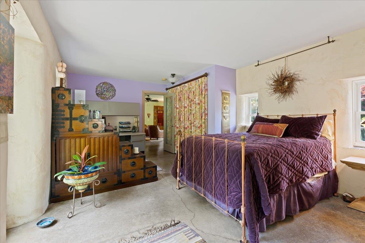 650 Sandy Bottom Road Elkton, VA 22827 - Photo 39 of 75 a bedroom with a bed and a large window