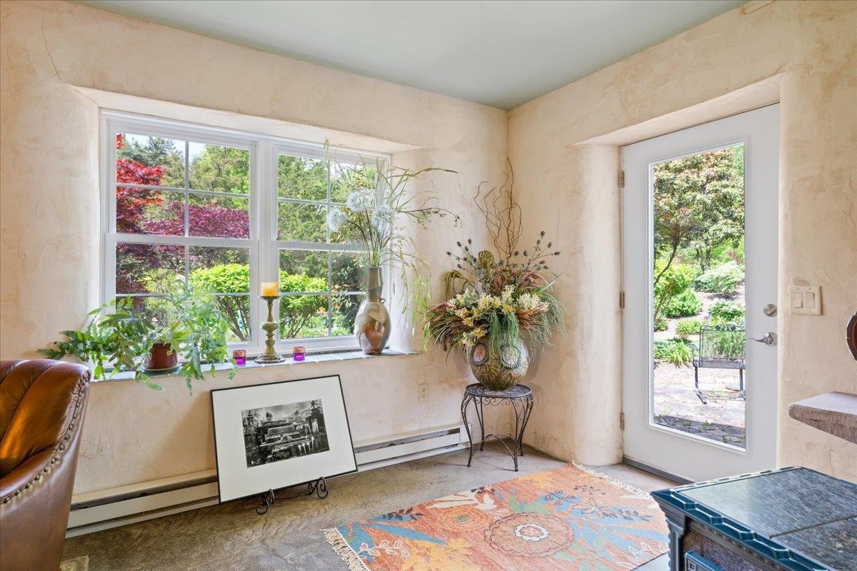 650 Sandy Bottom Road Elkton, VA 22827 - Photo 47 of 75 a living room with furniture and a potted plant