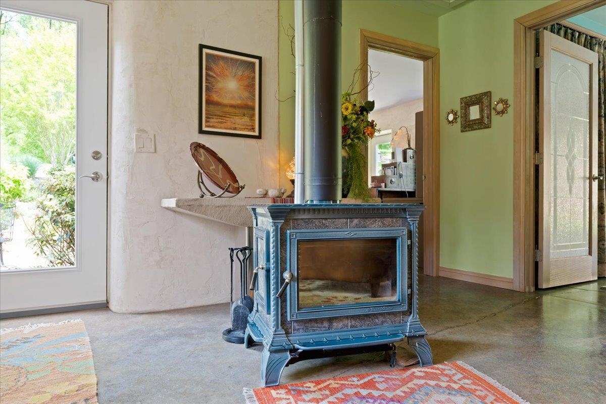 650 Sandy Bottom Road Elkton, VA 22827 - Photo 48 of 75 a living room with furniture and a fireplace