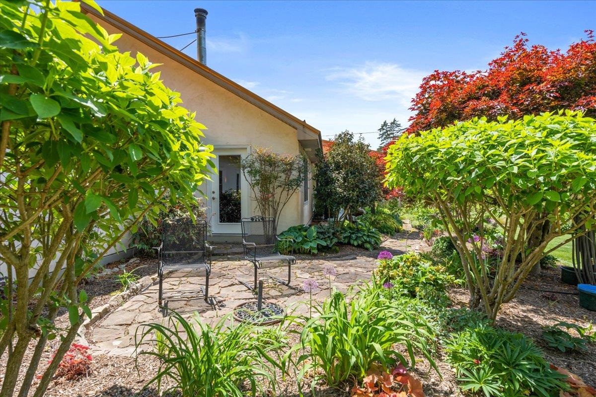650 Sandy Bottom Road Elkton, VA 22827 - Photo 50 of 75 a view of a chair and tables in the garden