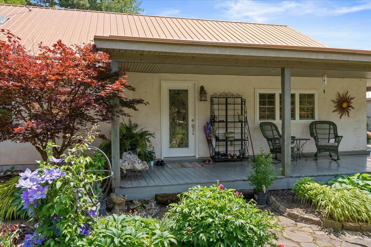 650 Sandy Bottom Road Elkton, VA 22827 - Photo 5 of 75 a front view of a house with garden