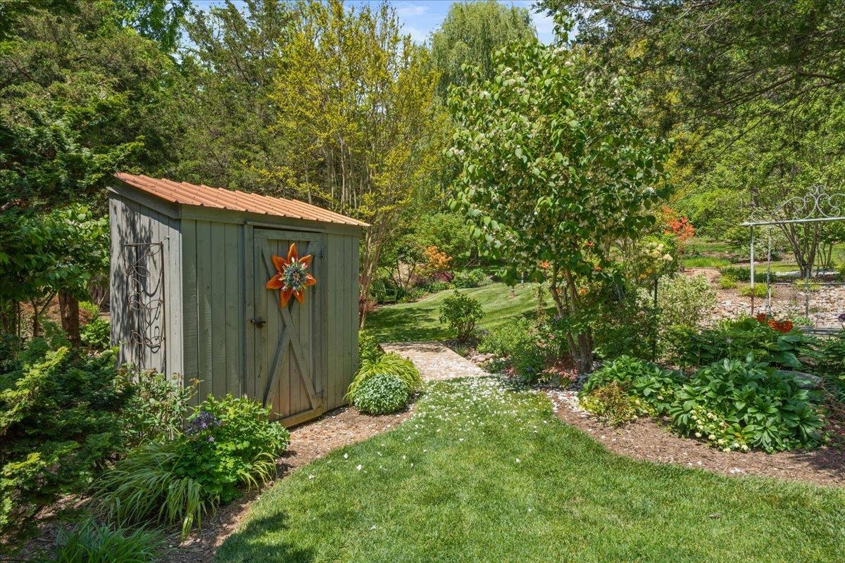 650 Sandy Bottom Road Elkton, VA 22827 - Photo 58 of 75 a front view of a house with garden
