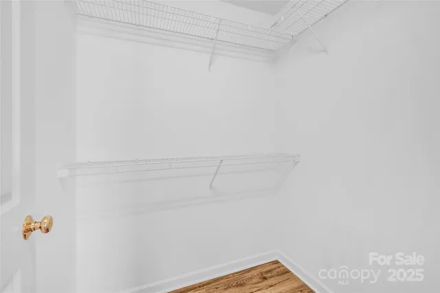 a view of small space with racks on the wall