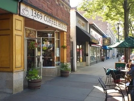 a view of a building with sitting area