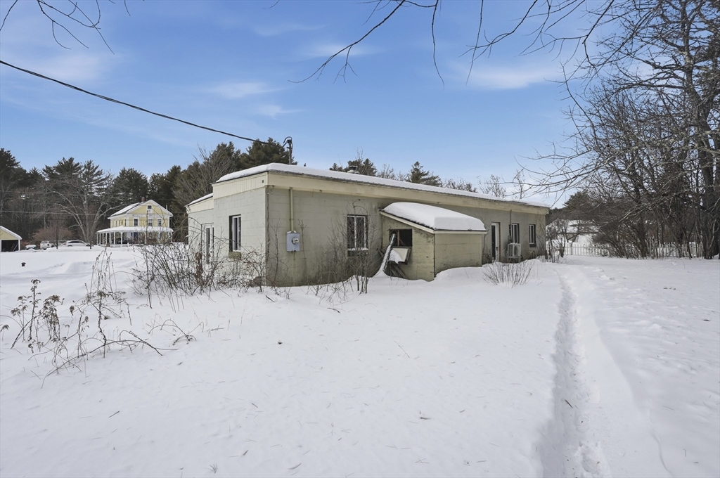 109 Royalston Road Orange, MA 01364 - Photo 19 of 27 a view of a house with snow on the road