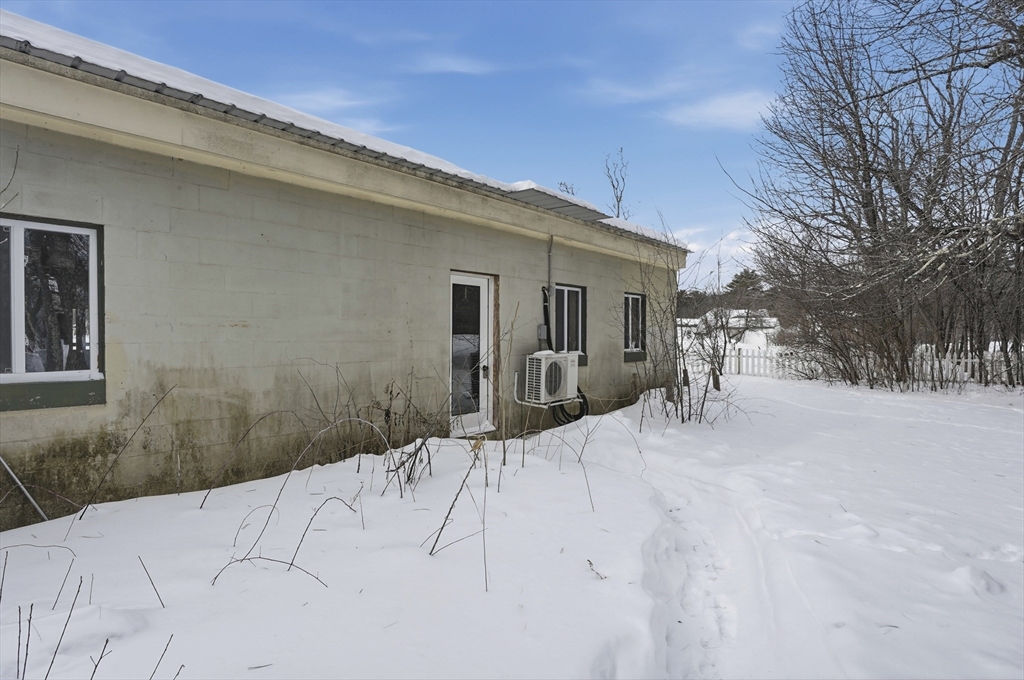 109 Royalston Road Orange, MA 01364 - Photo 20 of 27 a view of a house with a snow on the road