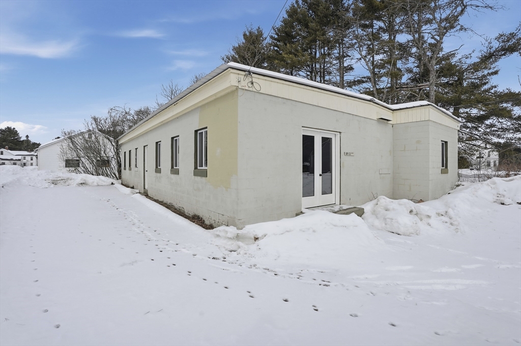 109 Royalston Road Orange, MA 01364 - Photo 2 of 27 a view of a house with a snow in the yard