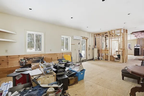 a very nice looking room with a large window and couch