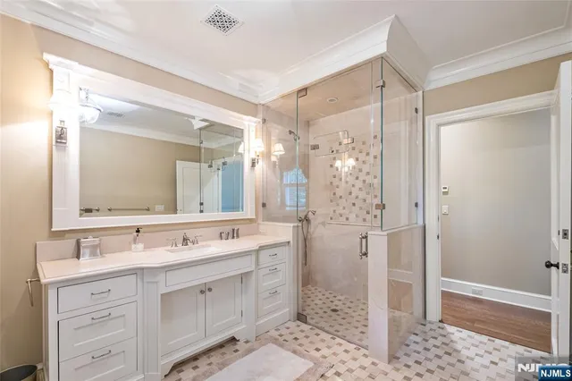 a view of a living room with furniture and chandelier