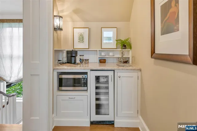 a spacious bathroom with a tub shower and sink