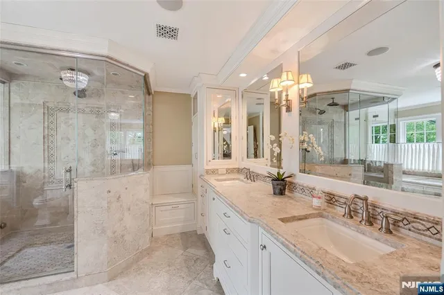 a utility room with sink dryer and washer